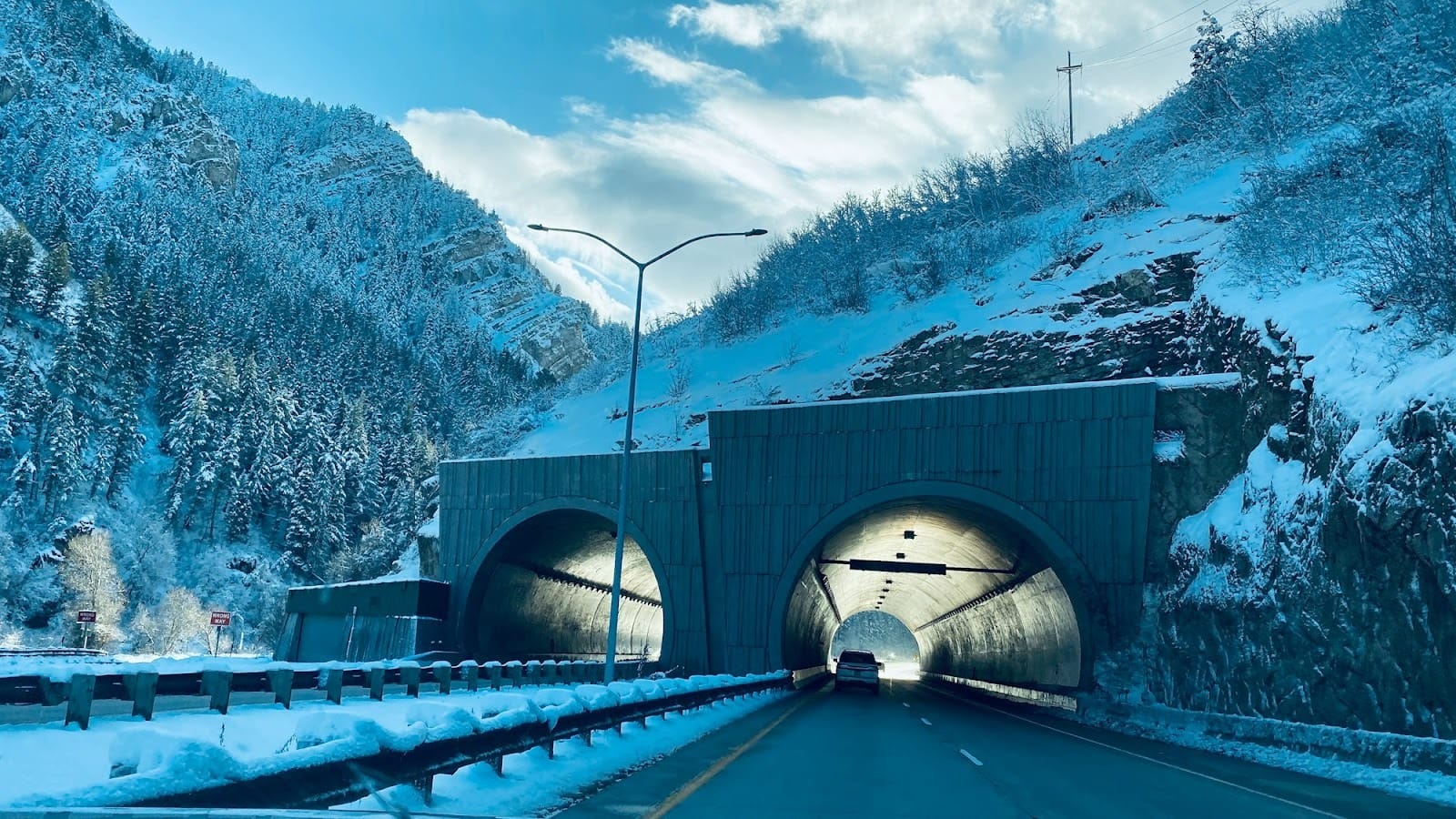 two gray concrete tunnels