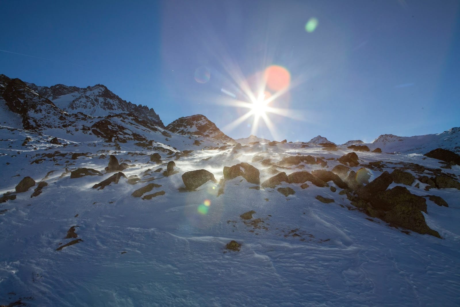 snow covered mountain under blue sky during daytime
